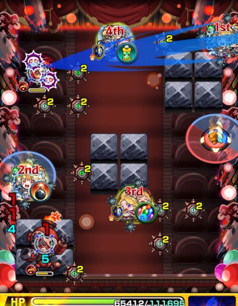 モンスト超究極・彩 グランギニョル(火属性)ステージ2の2手目。ドクロ雑魚を処理してロボットの弱点を出現させ、地雷を持ったキャラがロボット雑魚を撃破。ステージ2突破の瞬間を捉えたスクリーンショット。